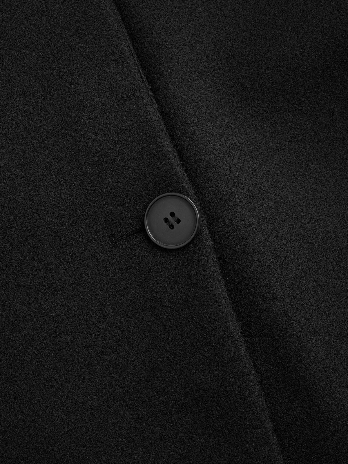 Veste en laine ornée d'une écharpe
