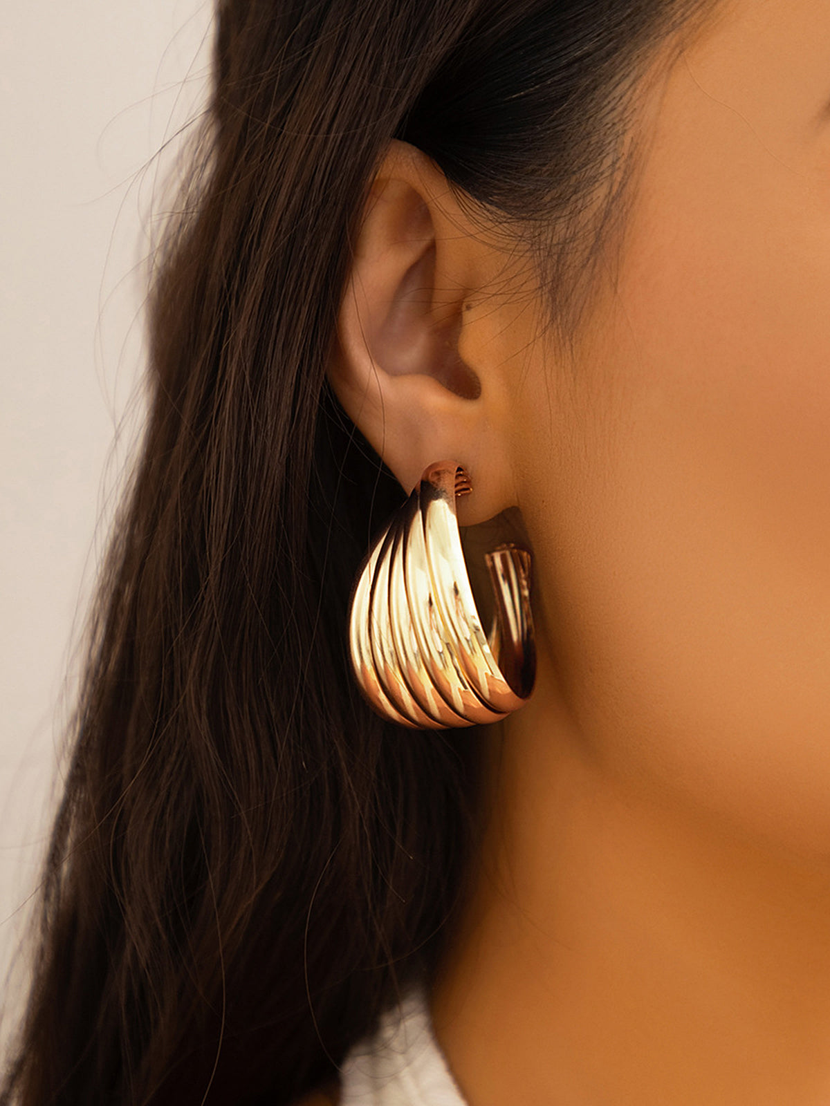 Sculpted Gold-Tone Swirl Hoop Earrings