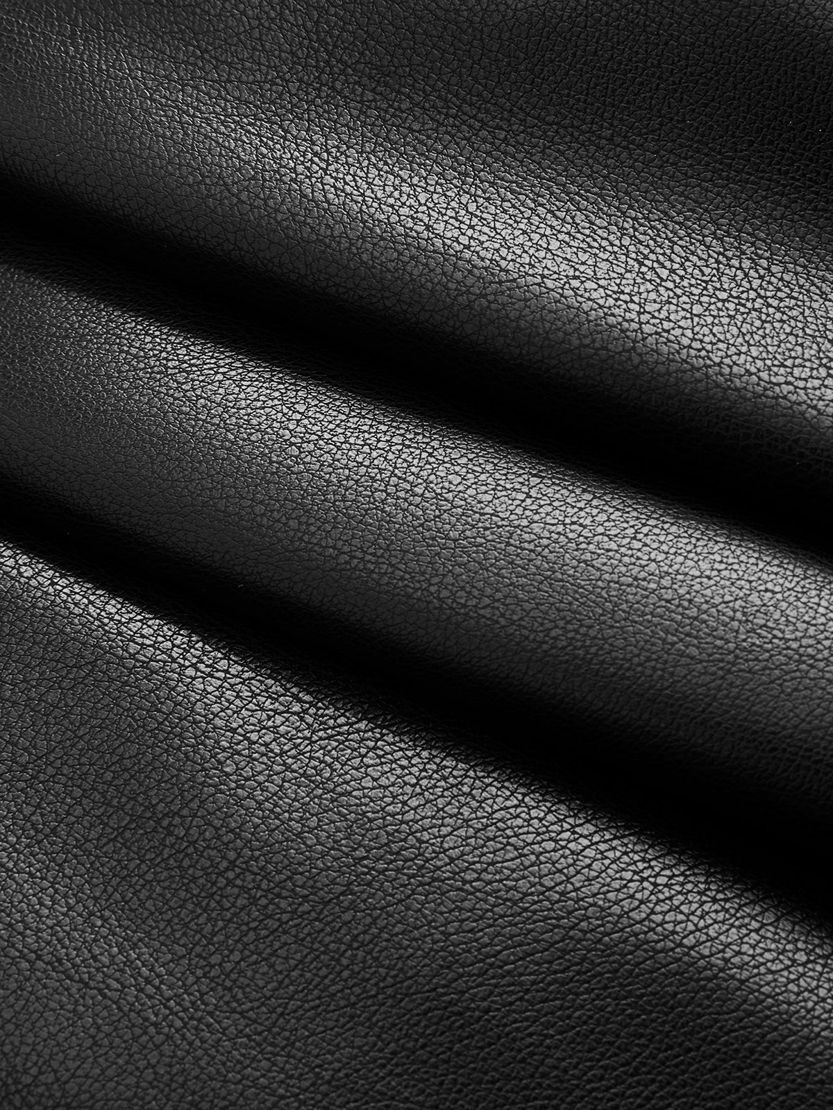Mini-jupe plissée froncée en similicuir