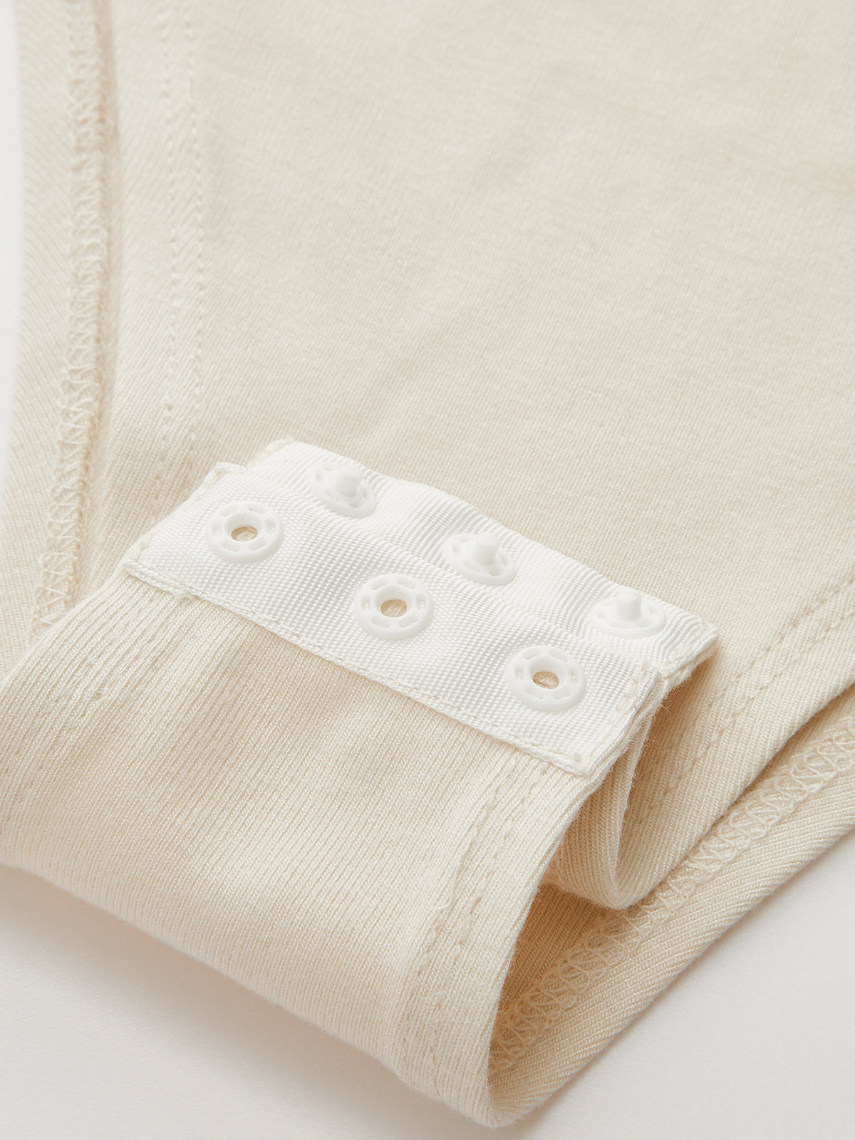 Metal Detail Mock Neck Ruched Bodysuit