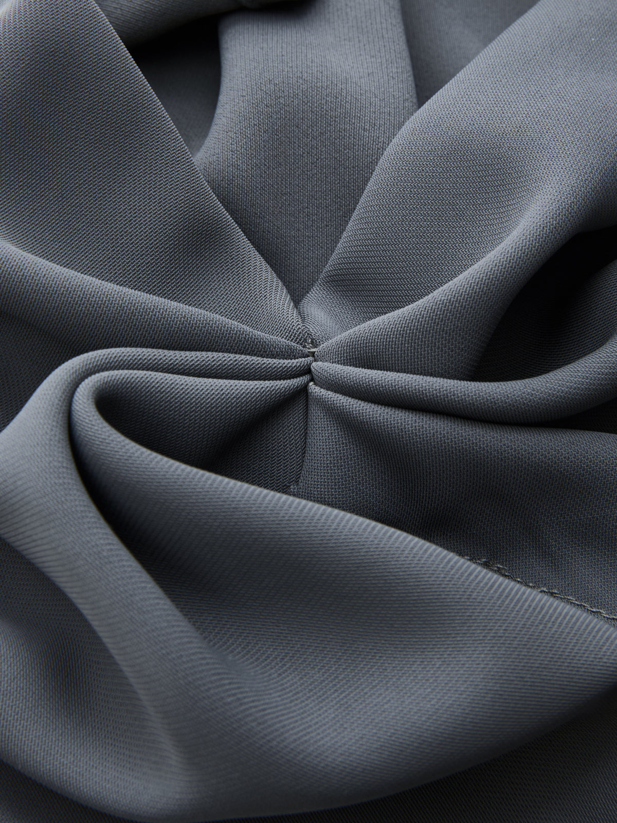 Combinaison drapée asymétrique ceinturée