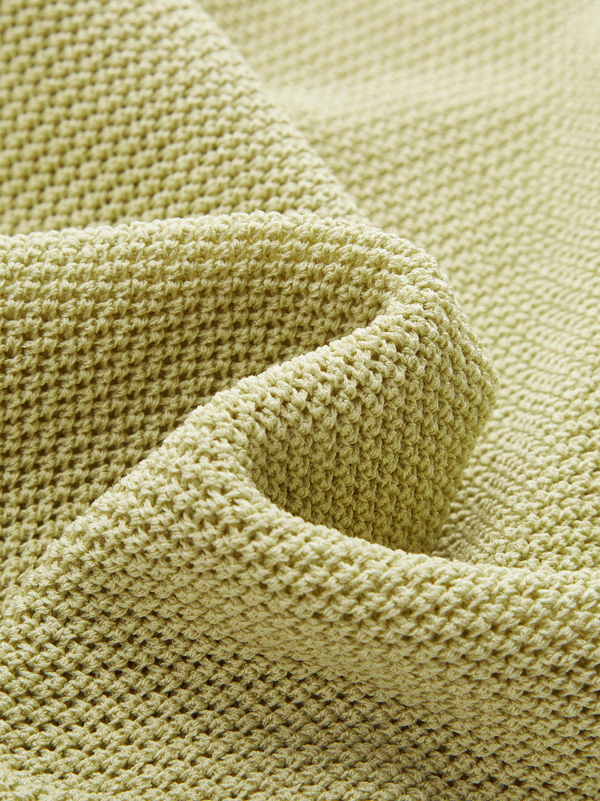 Gilet en tricot sans manches avec boutons en relief