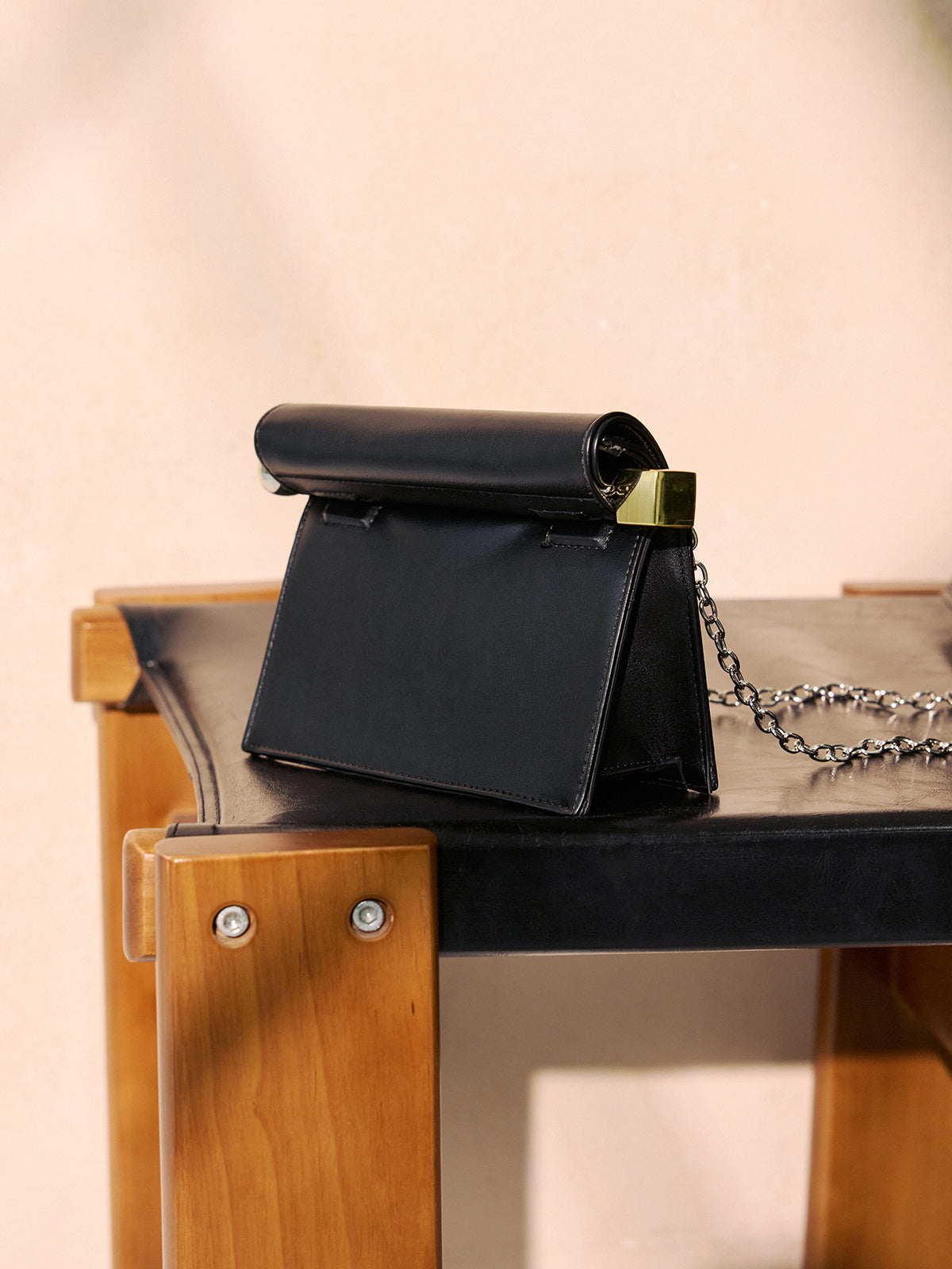Metal Accent Roll-Top Clutch Bag