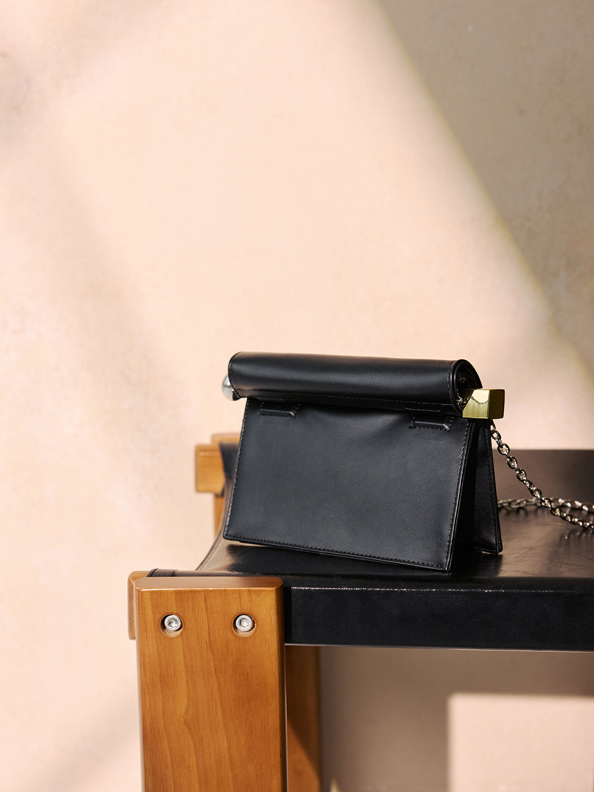 Metal Accent Roll-Top Clutch Bag