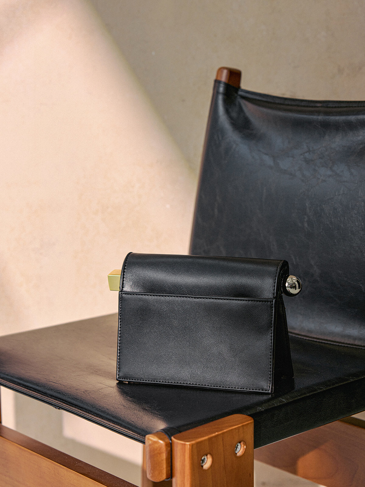 Metal Accent Roll-Top Clutch Bag