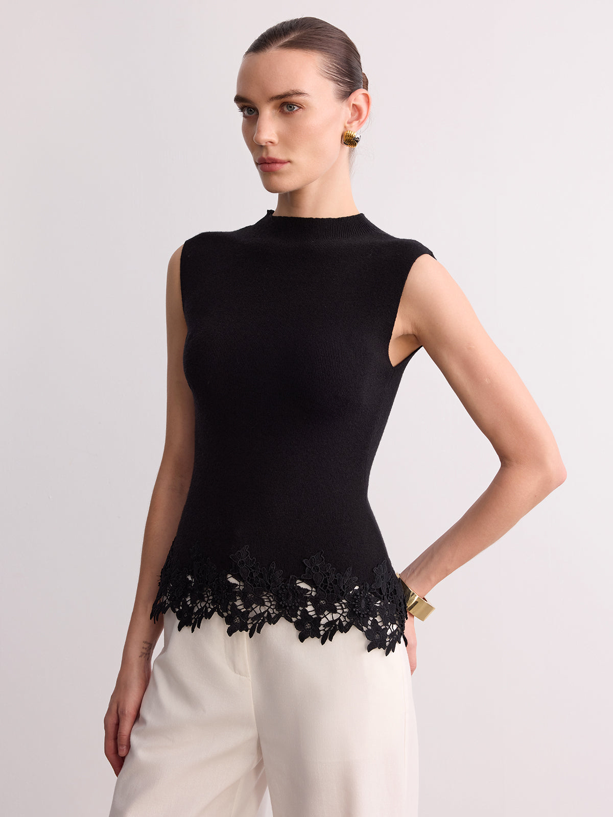 Gilet en maille sans manches avec ourlet en dentelle