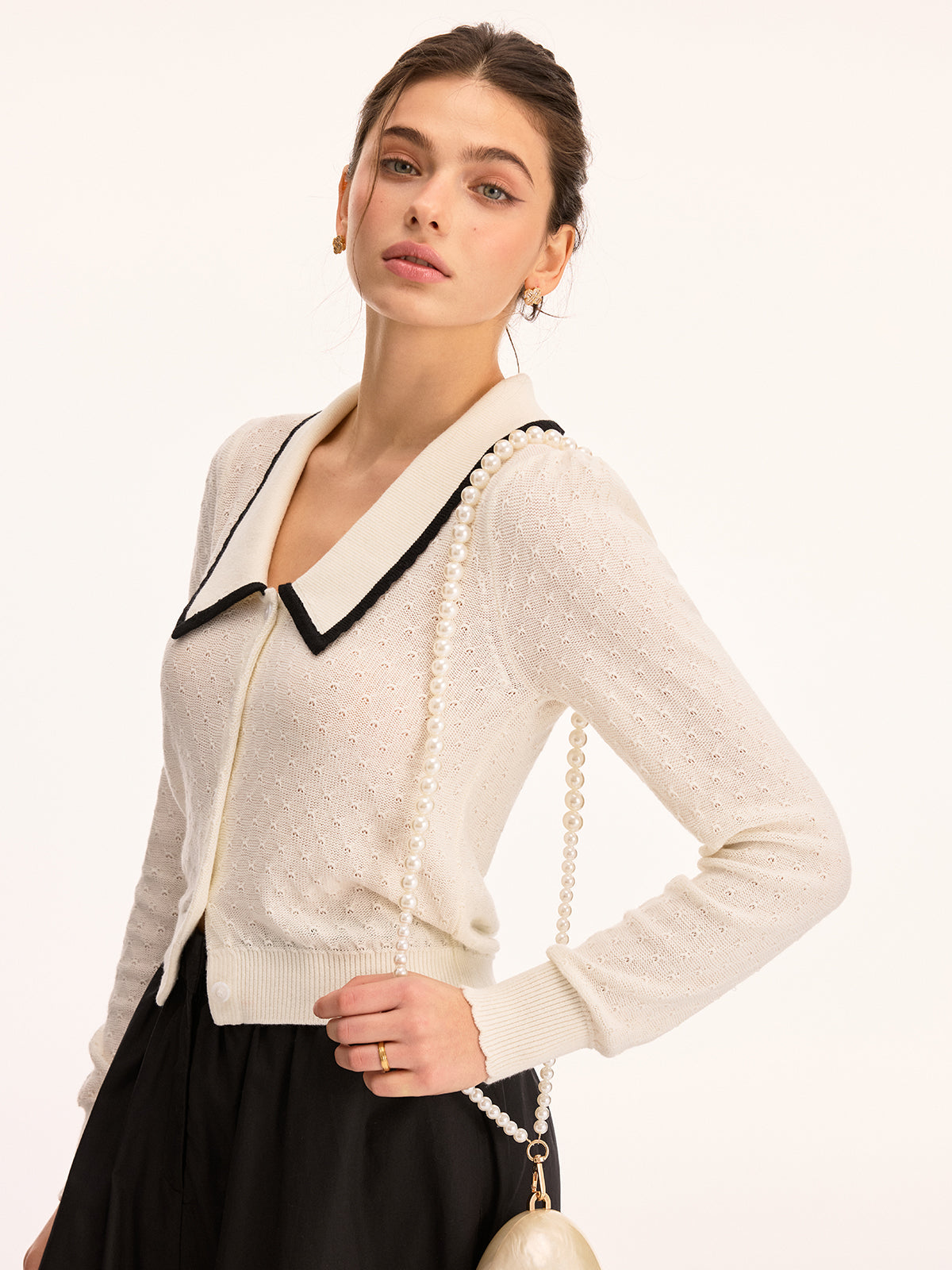 Gilet en maille ajourée à col en mélange de laine