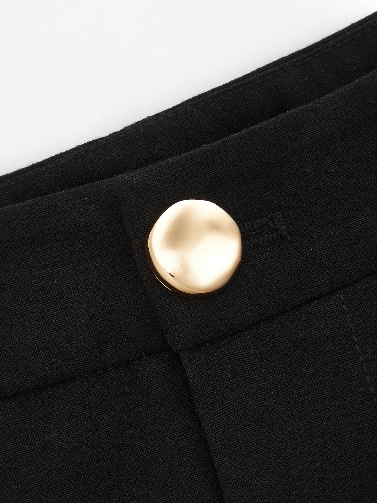 Ensemble haut froncé sans manches et pantalon plissé