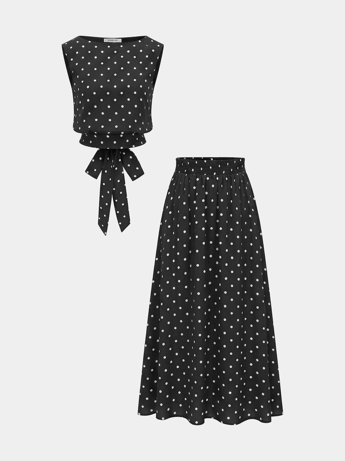 Ensemble haut sans manches et jupe longue à pois
