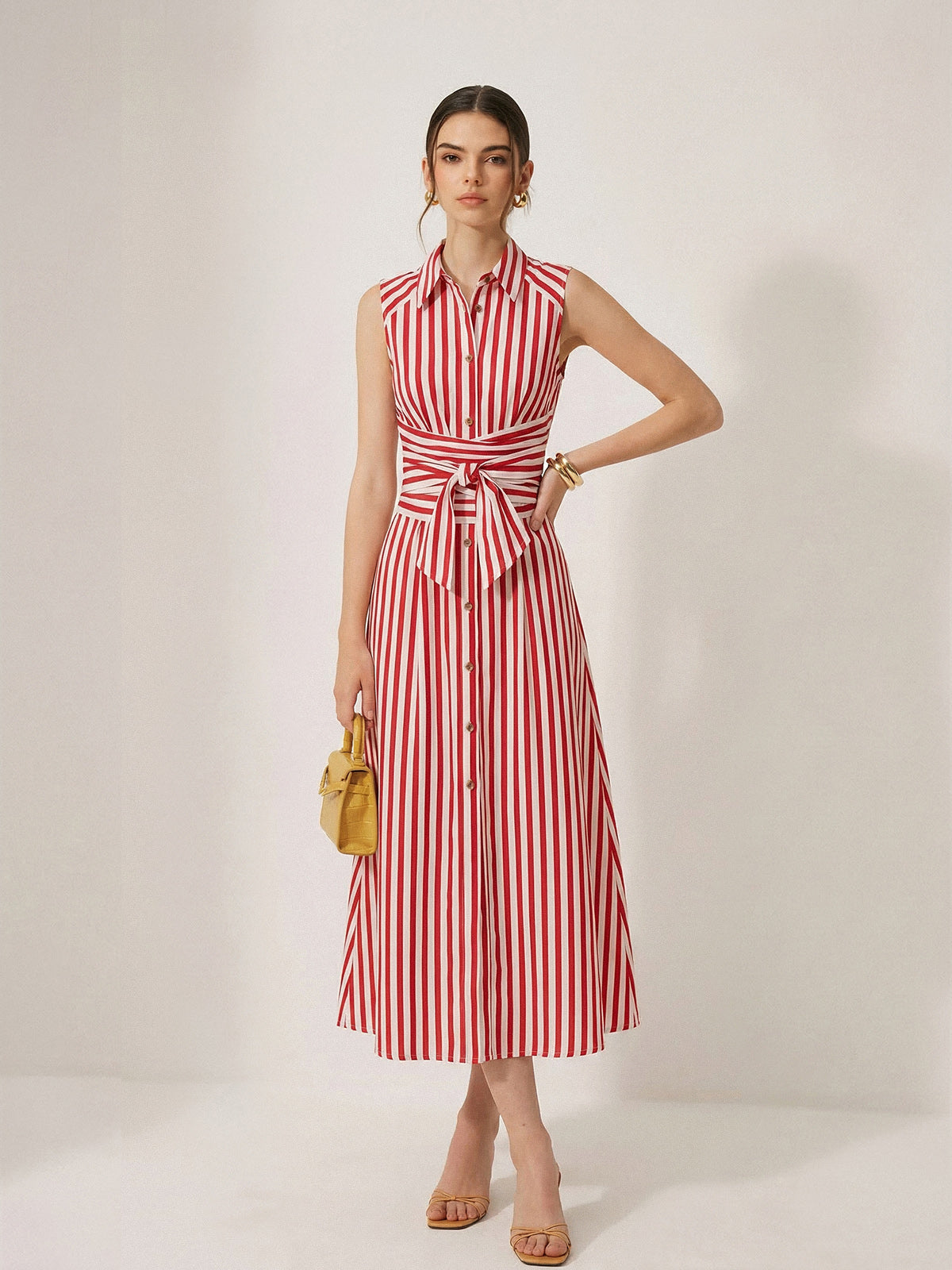 Robe longue sans manches rayée avec taille à nouer