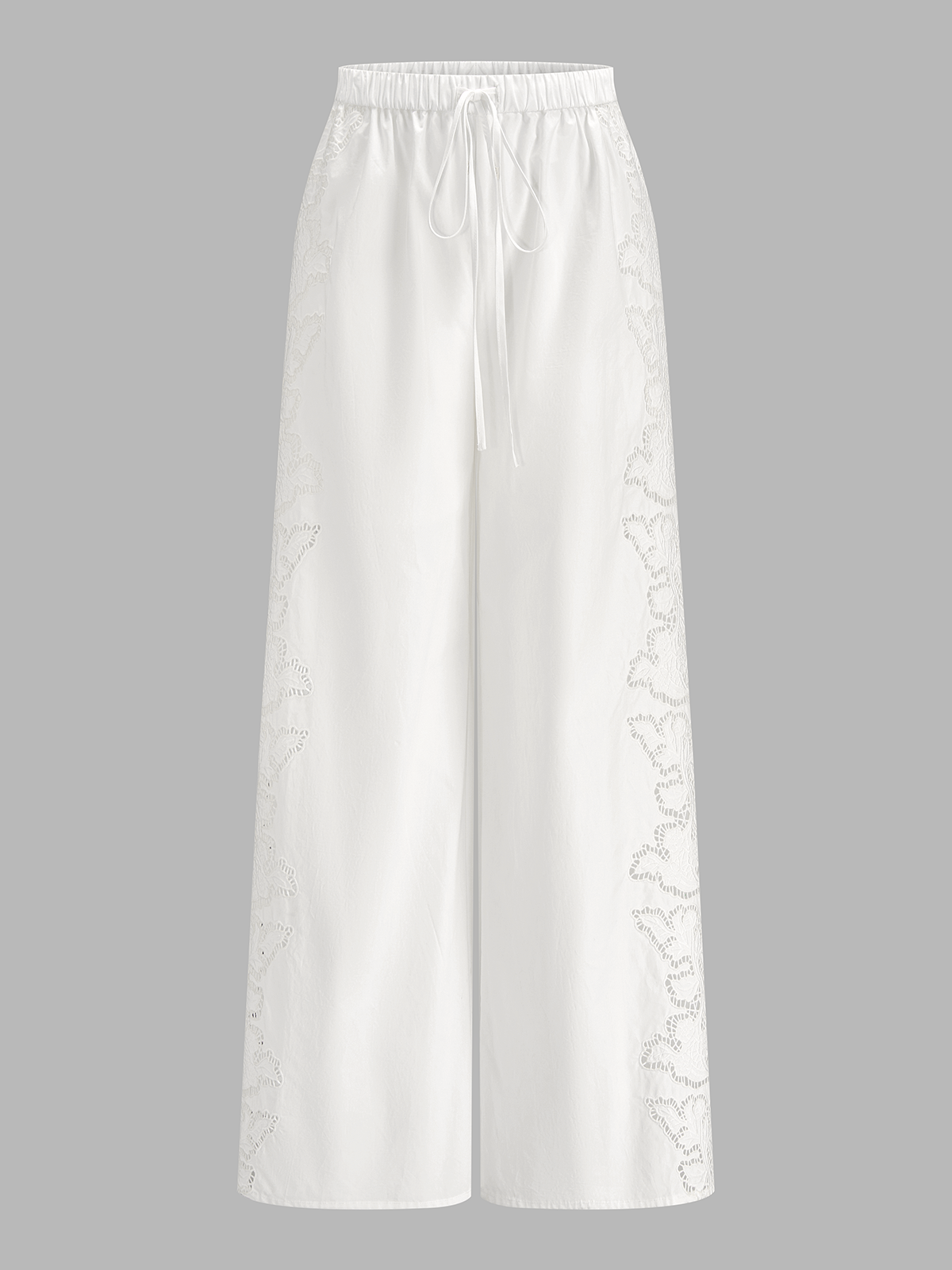 Pantalon en coton brodé à cordon de serrage et à lacets latéraux