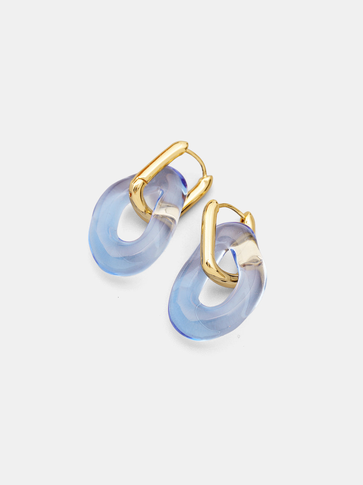 Boucles d'oreilles créoles maillons dorés en verre transparent