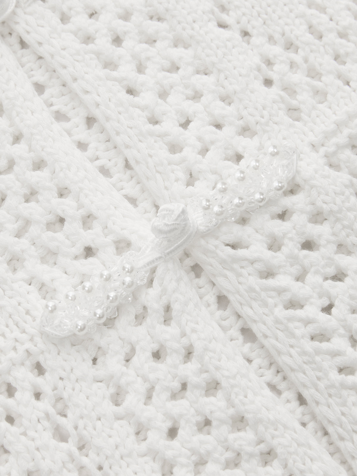 Haut à manches courtes en tricot/crochet avec brandebourg en forme de grenouille