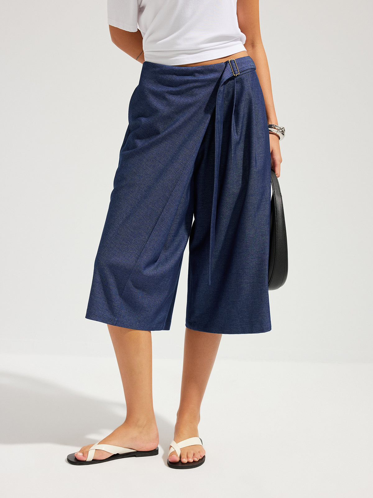 Pantalon Capri coupe ample, portefeuille et ceinturé