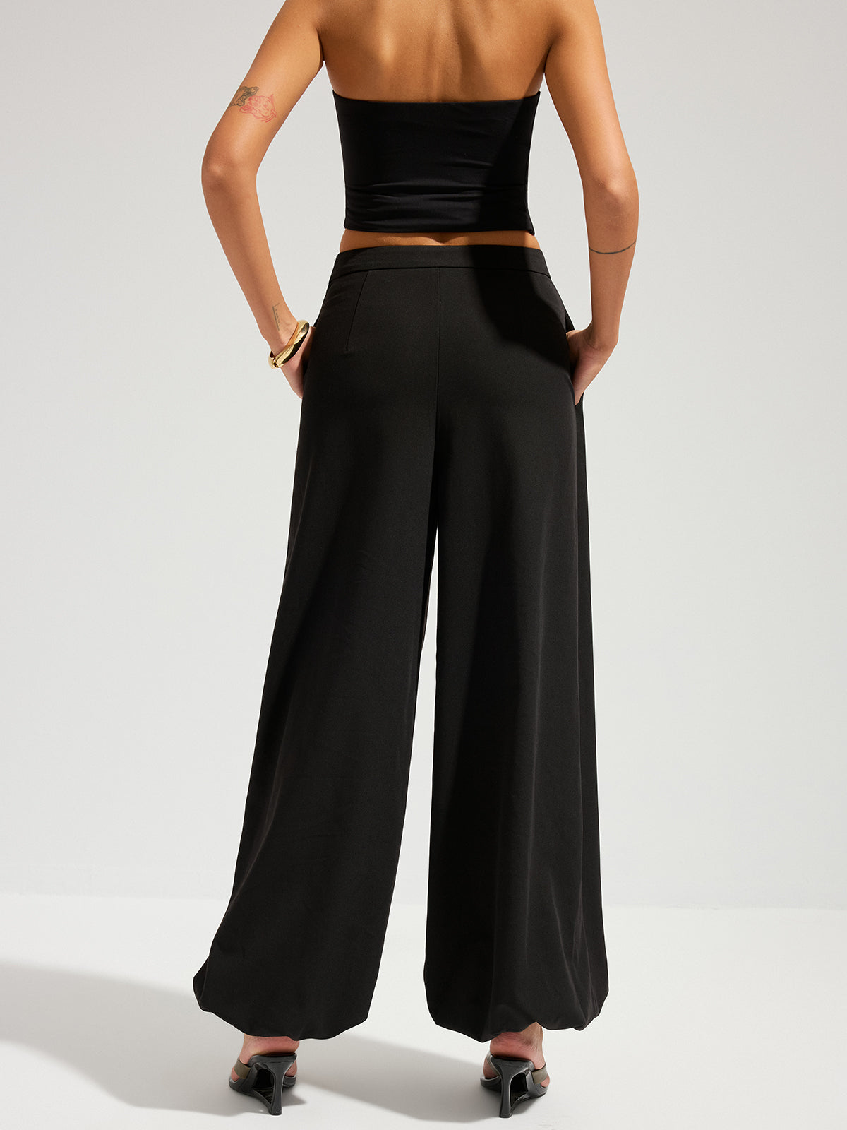 Pantalon large asymétrique à superposition