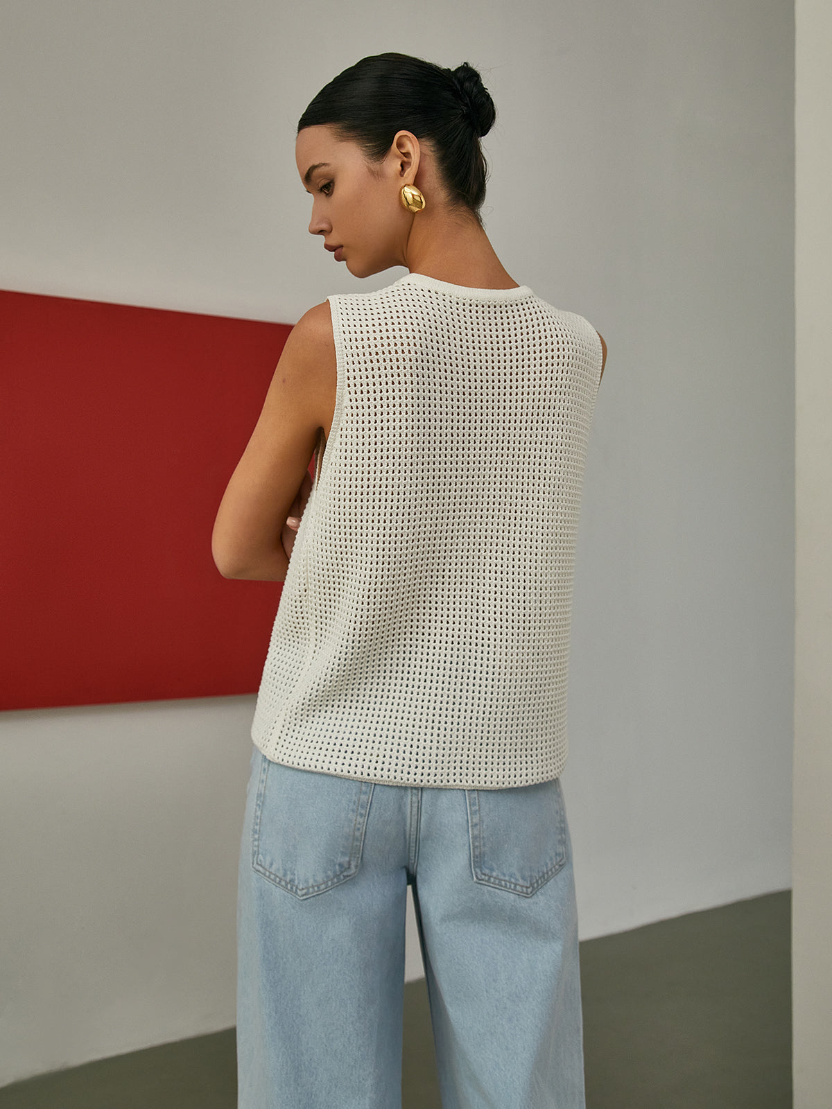 Gilet sans manches en maille ajourée 