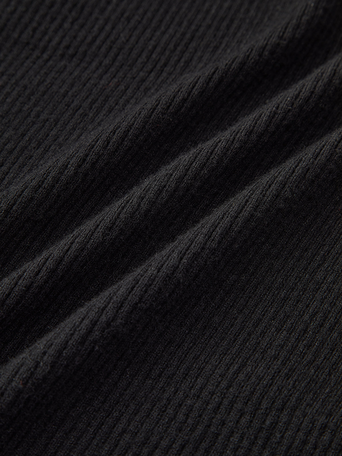 Robe en maille fendue à col V et dos nu 