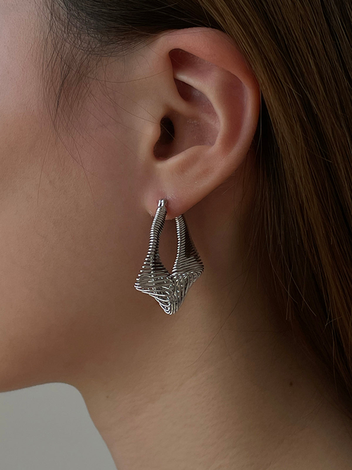 Boucles d'oreilles pendantes Twist Wave 