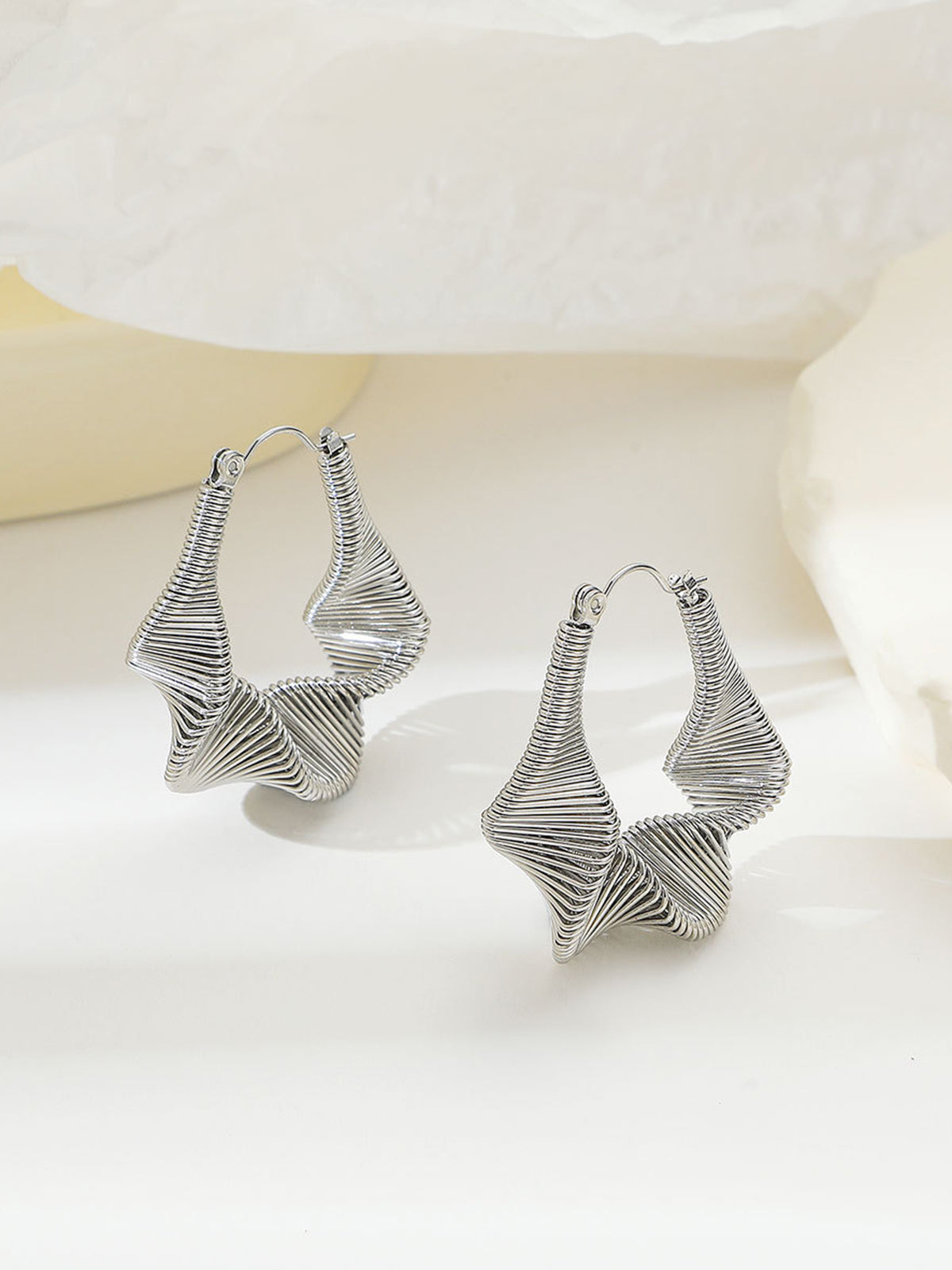 Boucles d'oreilles pendantes Twist Wave 
