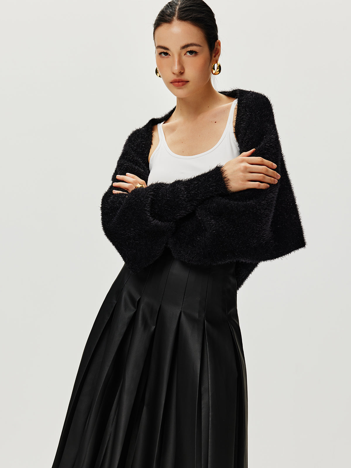 Haussement d'épaules Caïdigan duveteux