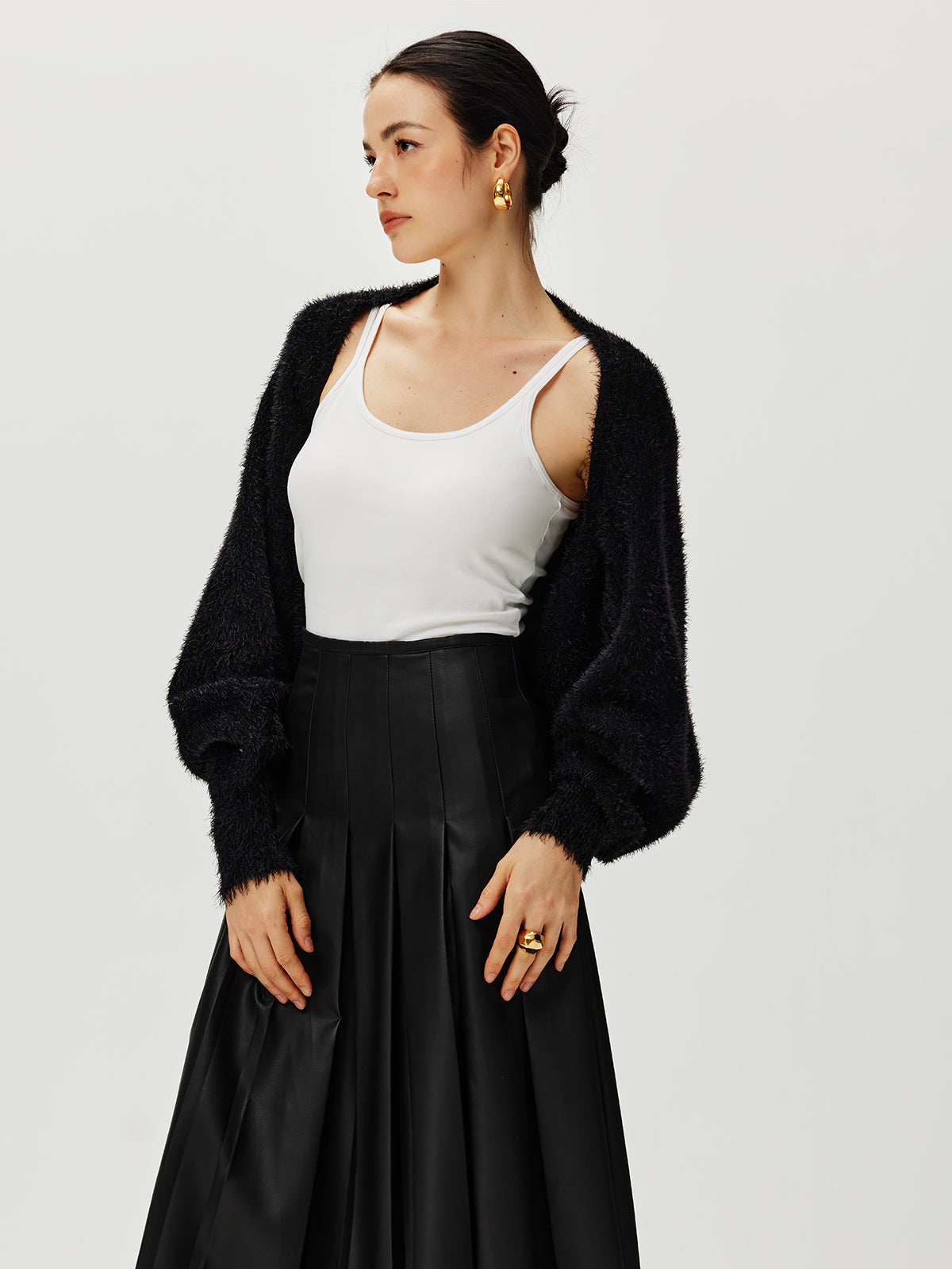 Haussement d'épaules Caïdigan duveteux