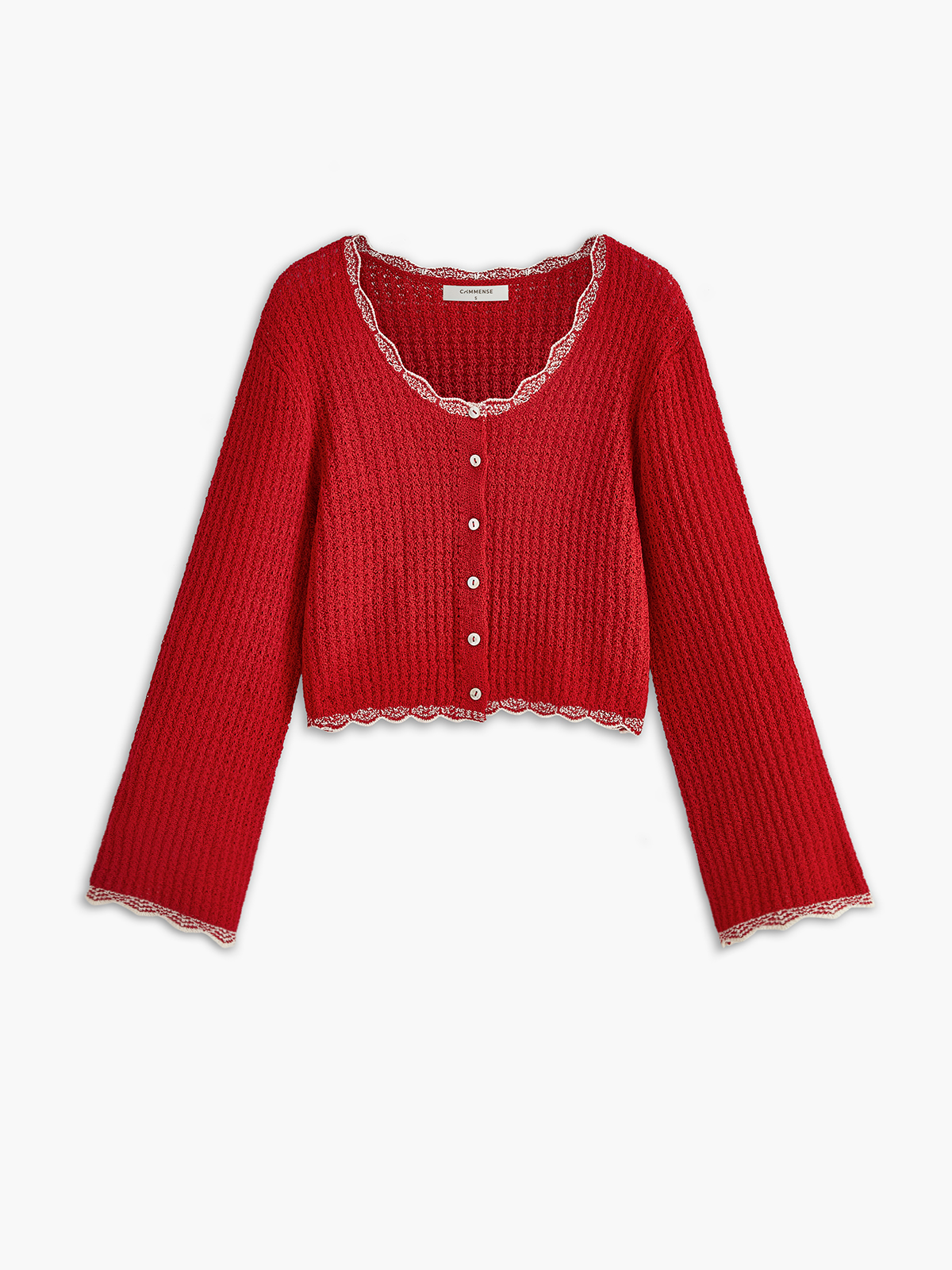 Cardigan à bordure ondulée et boutonnage 