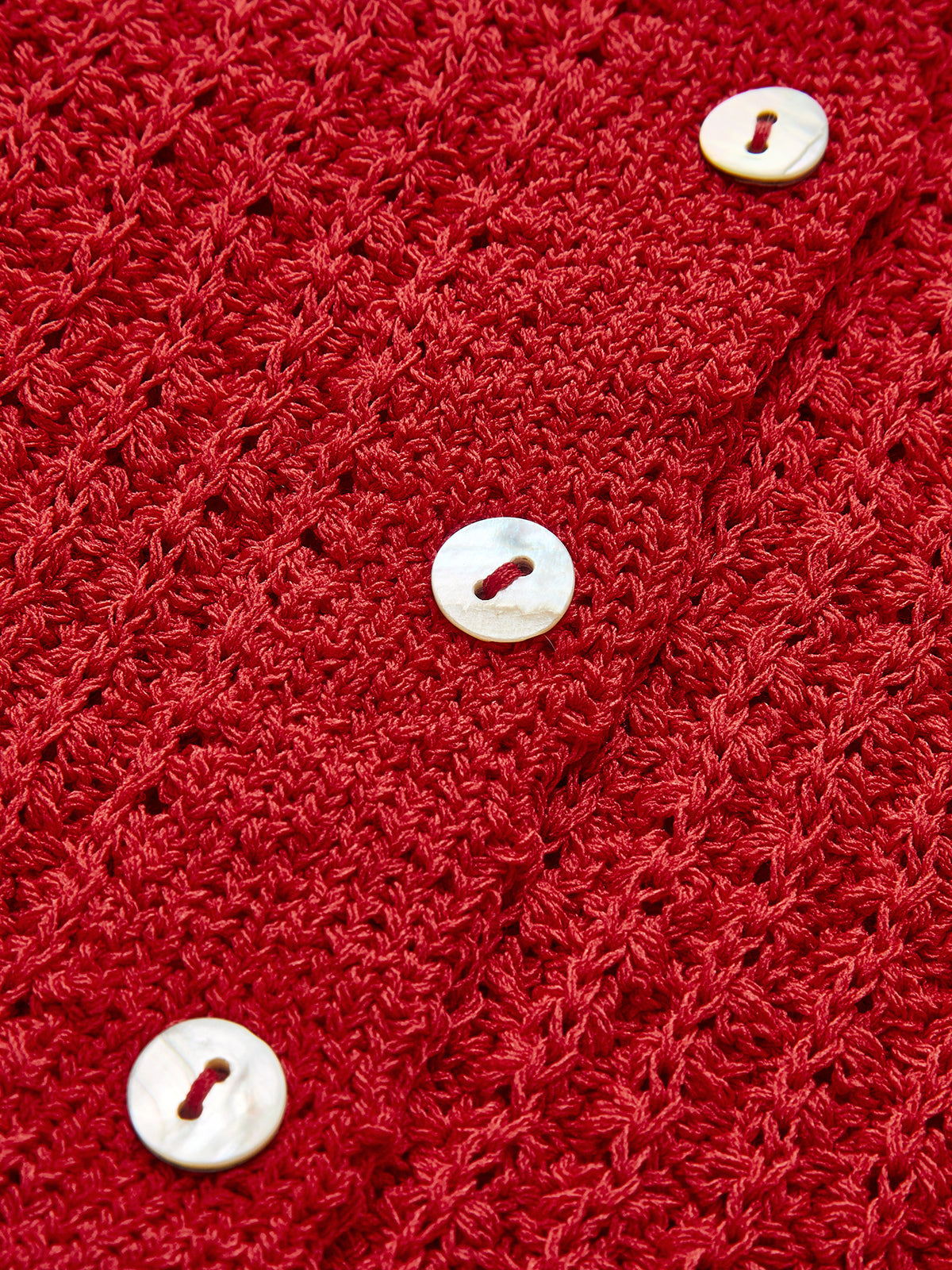 Cardigan à bordure ondulée et boutonnage 