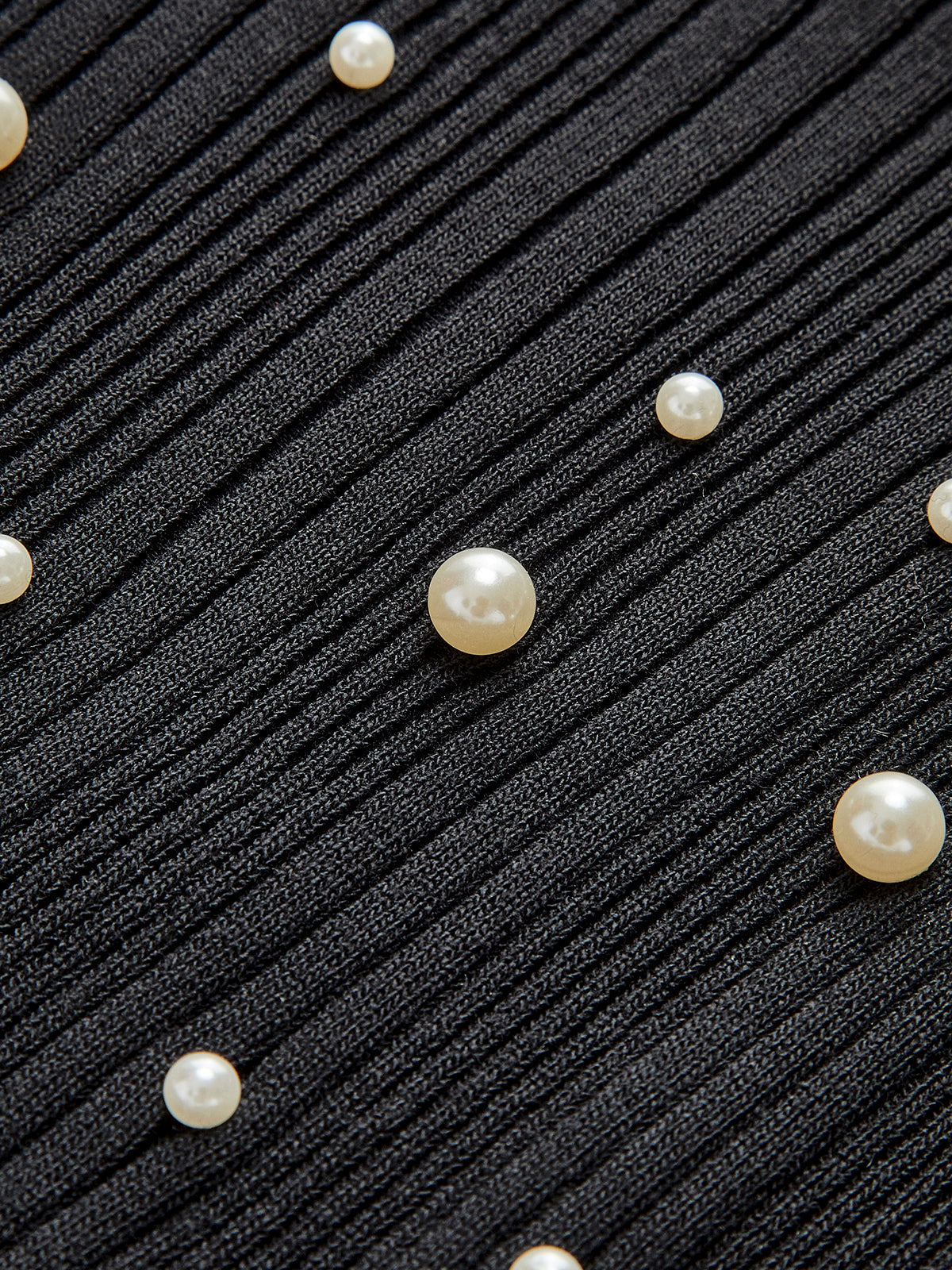 Gilet extensible à perles 