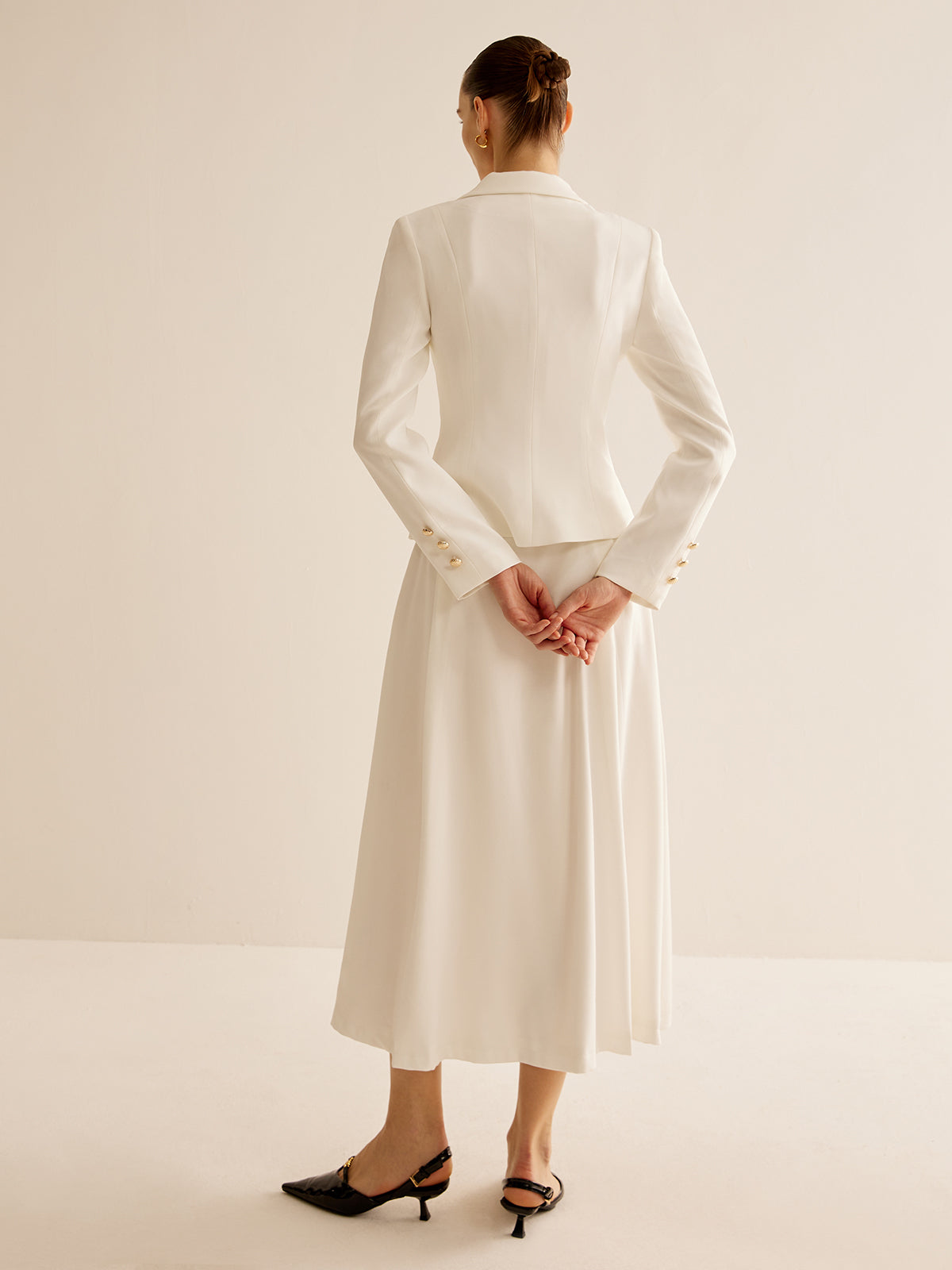 Blazer élégant à boutons métalliques 