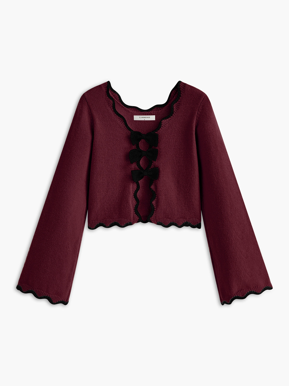 Pull à nœud et bordure ondulée contrastée 