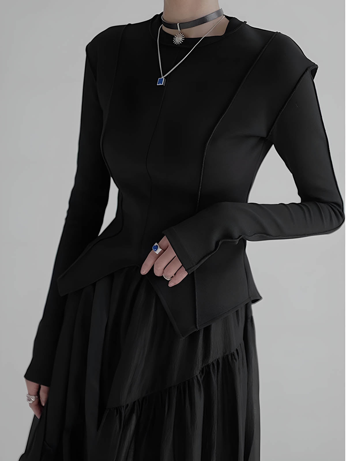 Blouse slim en jersey à passepoil 