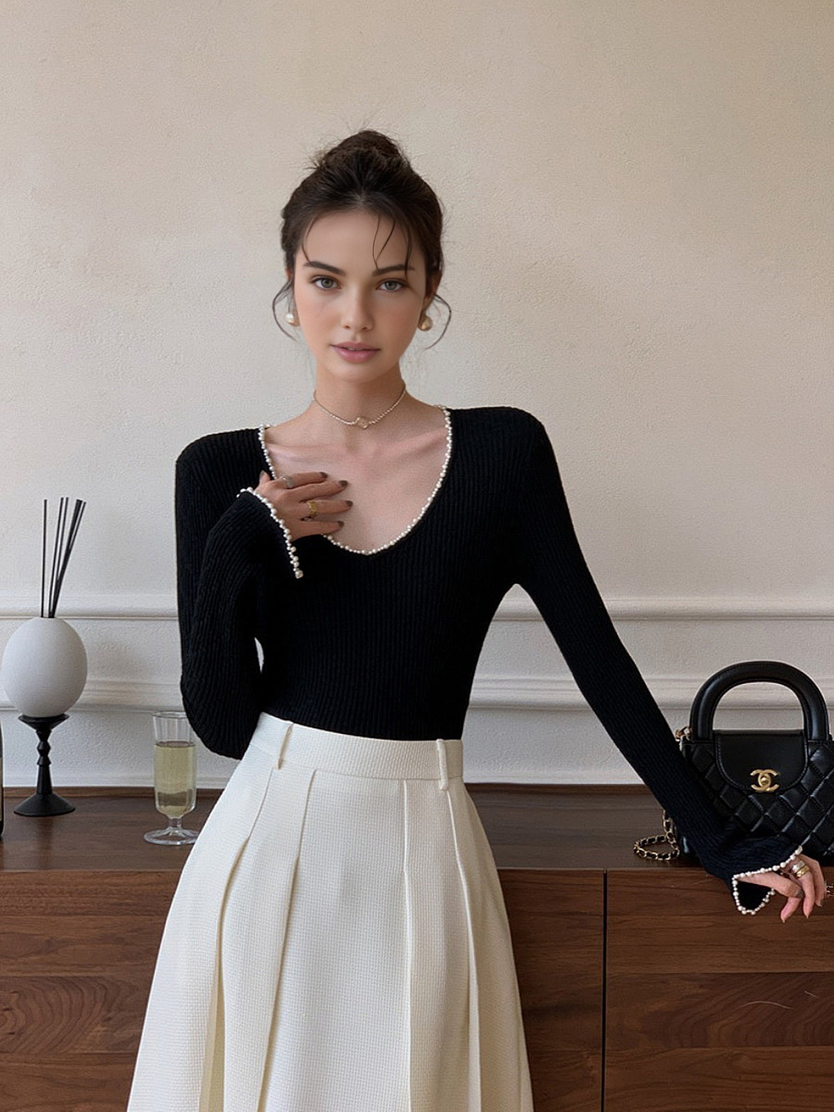 Haut en maille à col en V et bordure perlée 