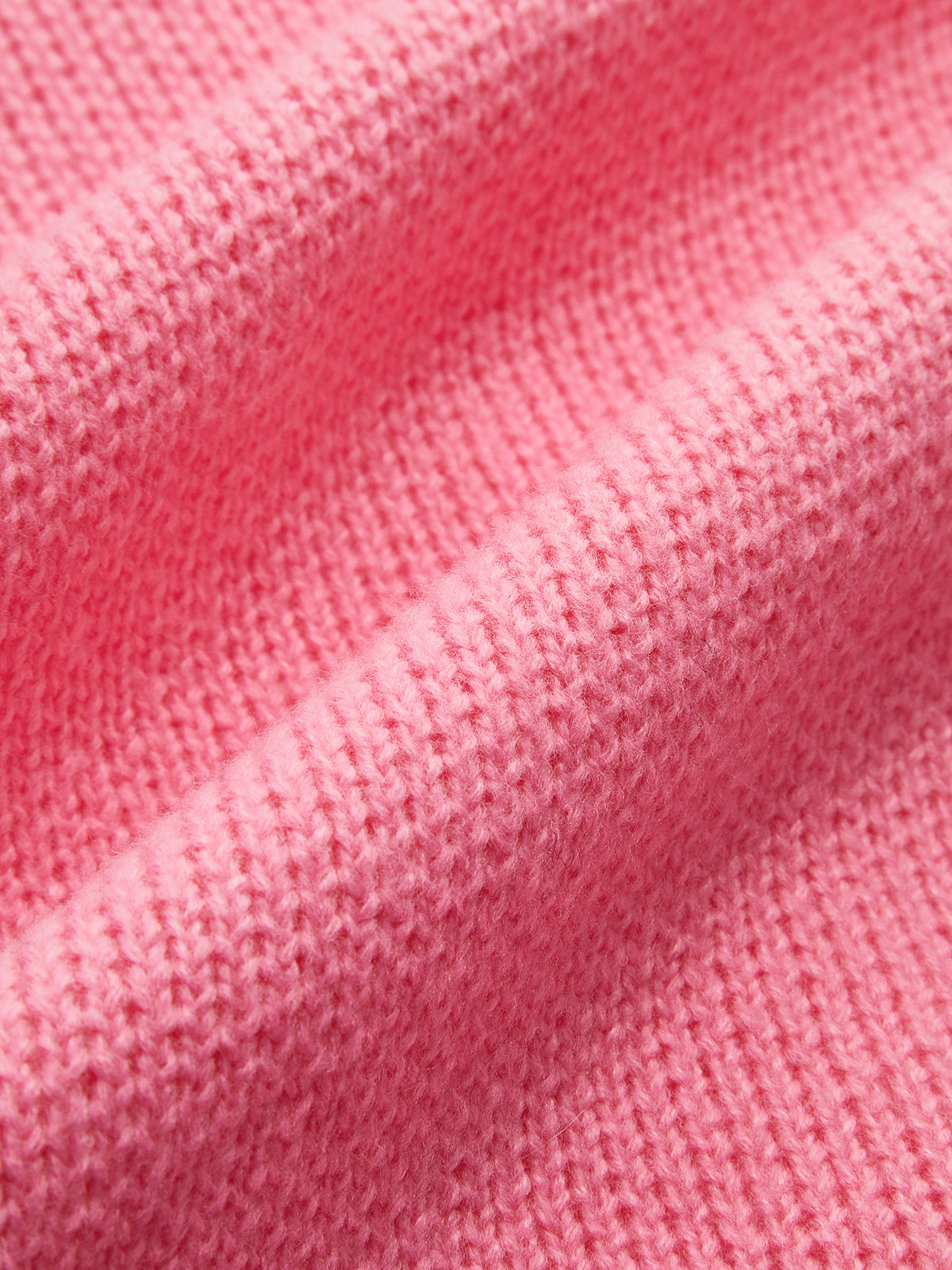 Strickoberteil mit Rundhalsausschnitt und goldenen Knöpfen 