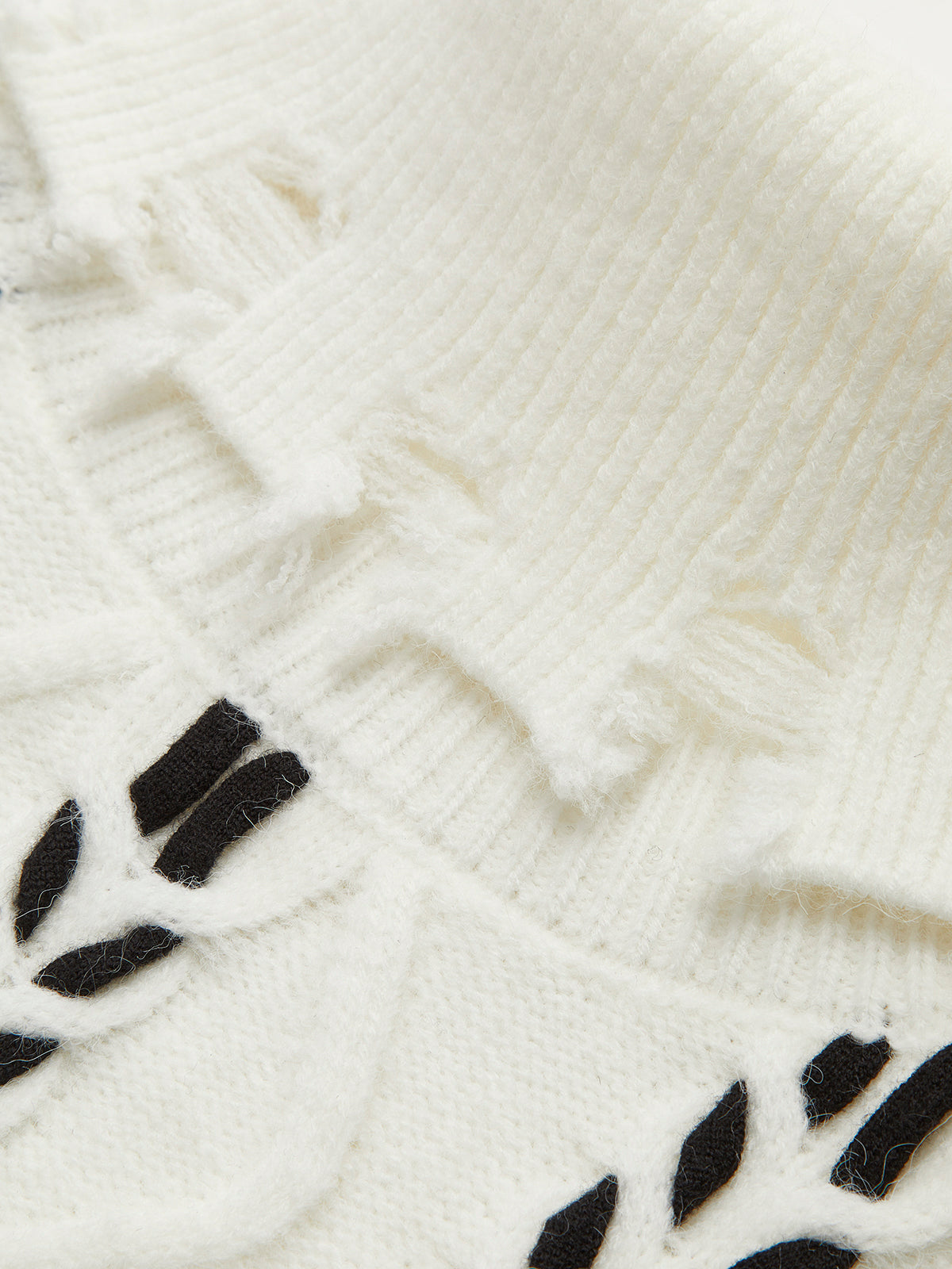 Rollkragenpullover mit offenem Saum und Twist-Effekt 