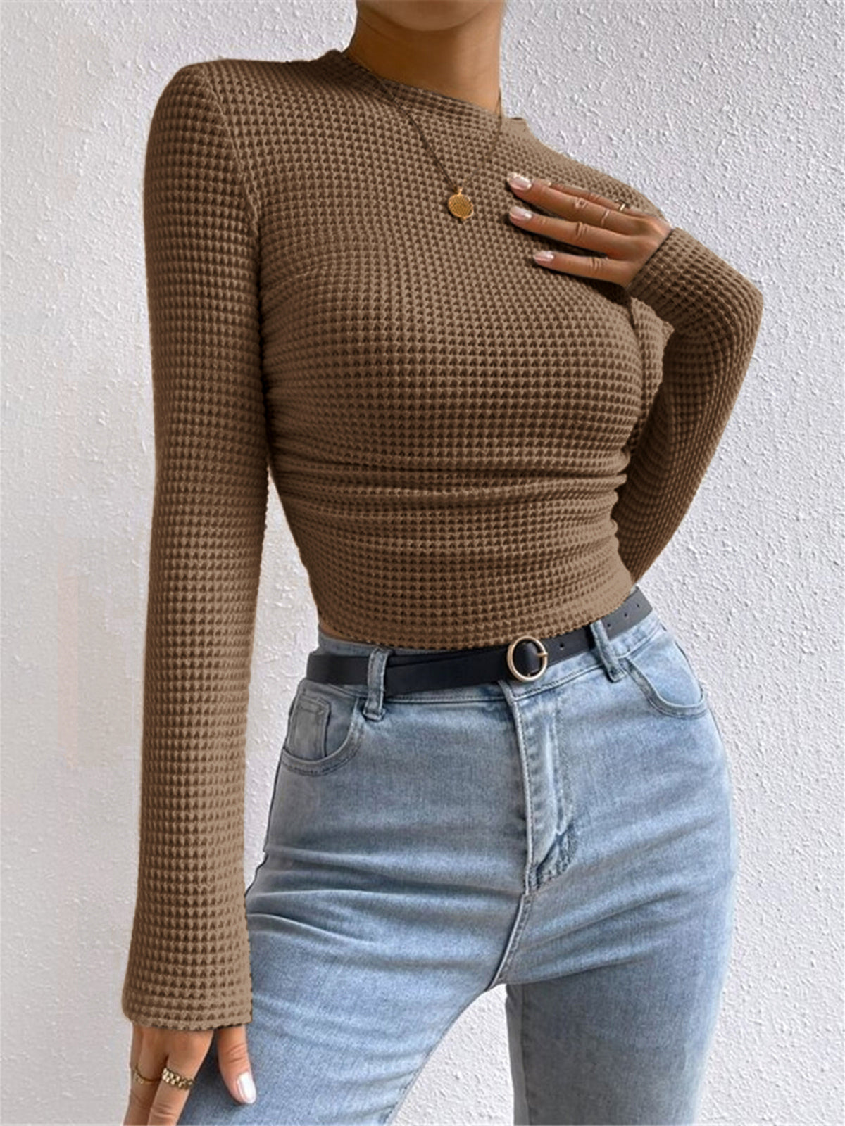 Pull slim uni en maille gaufrée 