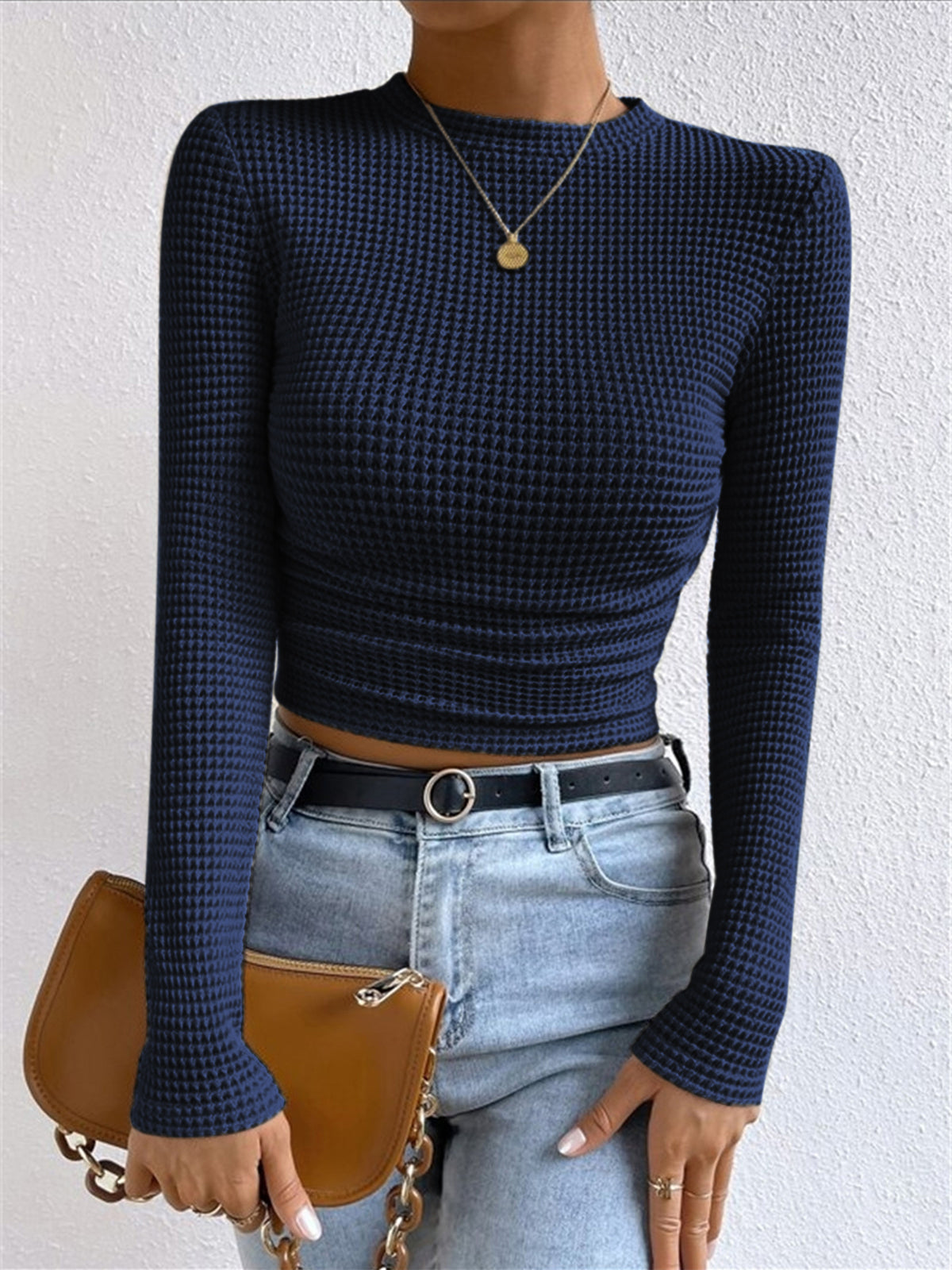 Pull slim uni en maille gaufrée 
