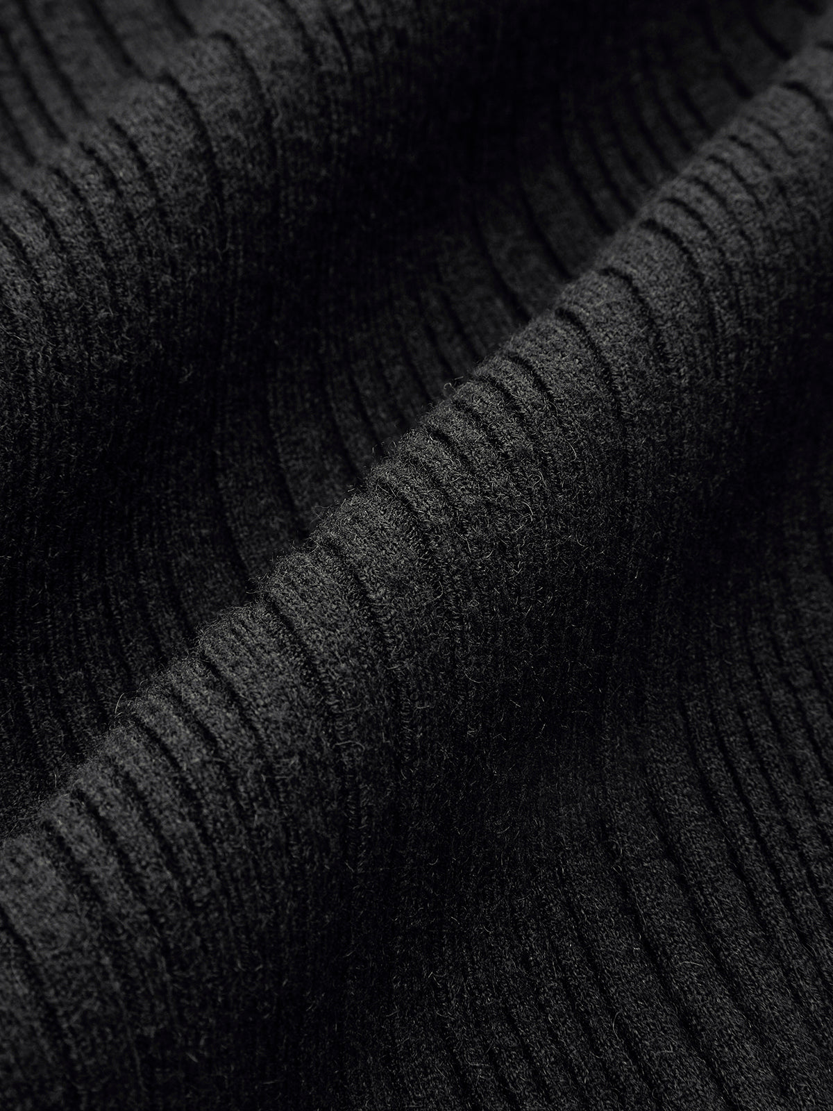 Haut en maille à poignets volantés et décor perlé 