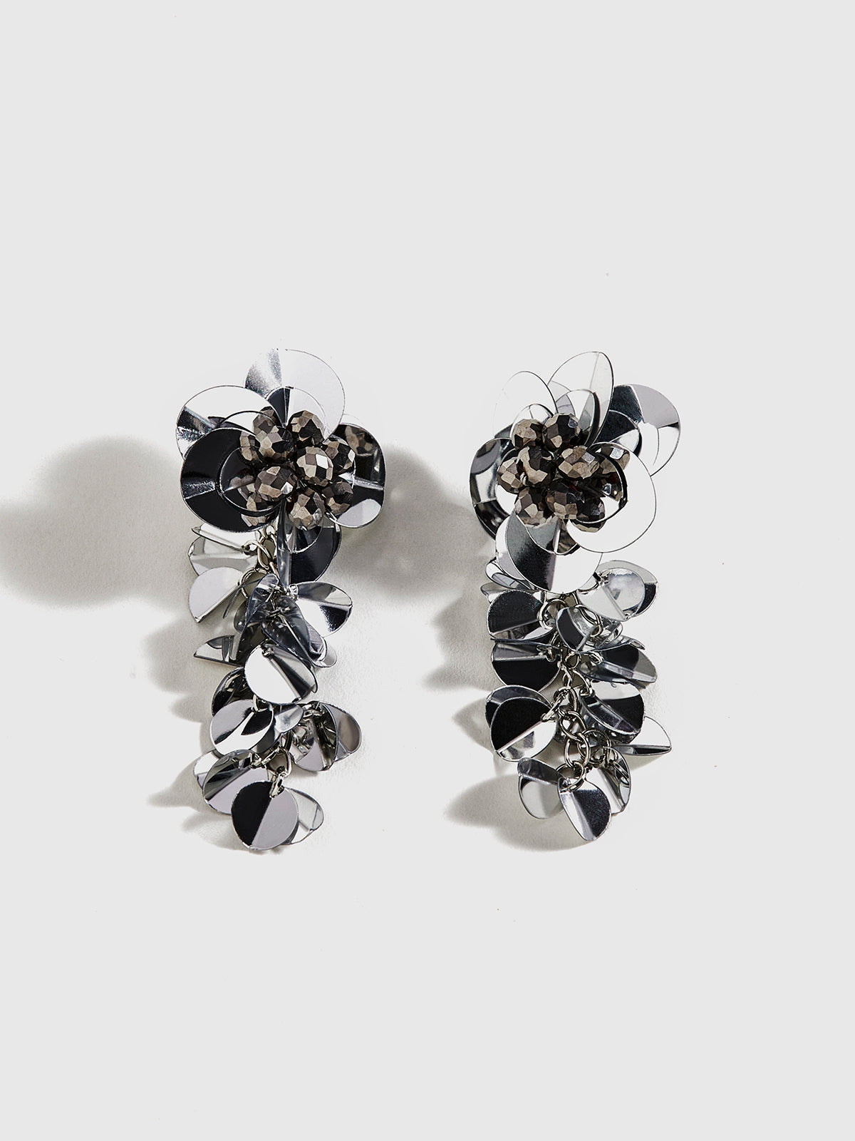 Boucles d'oreilles élégantes à pompons floraux