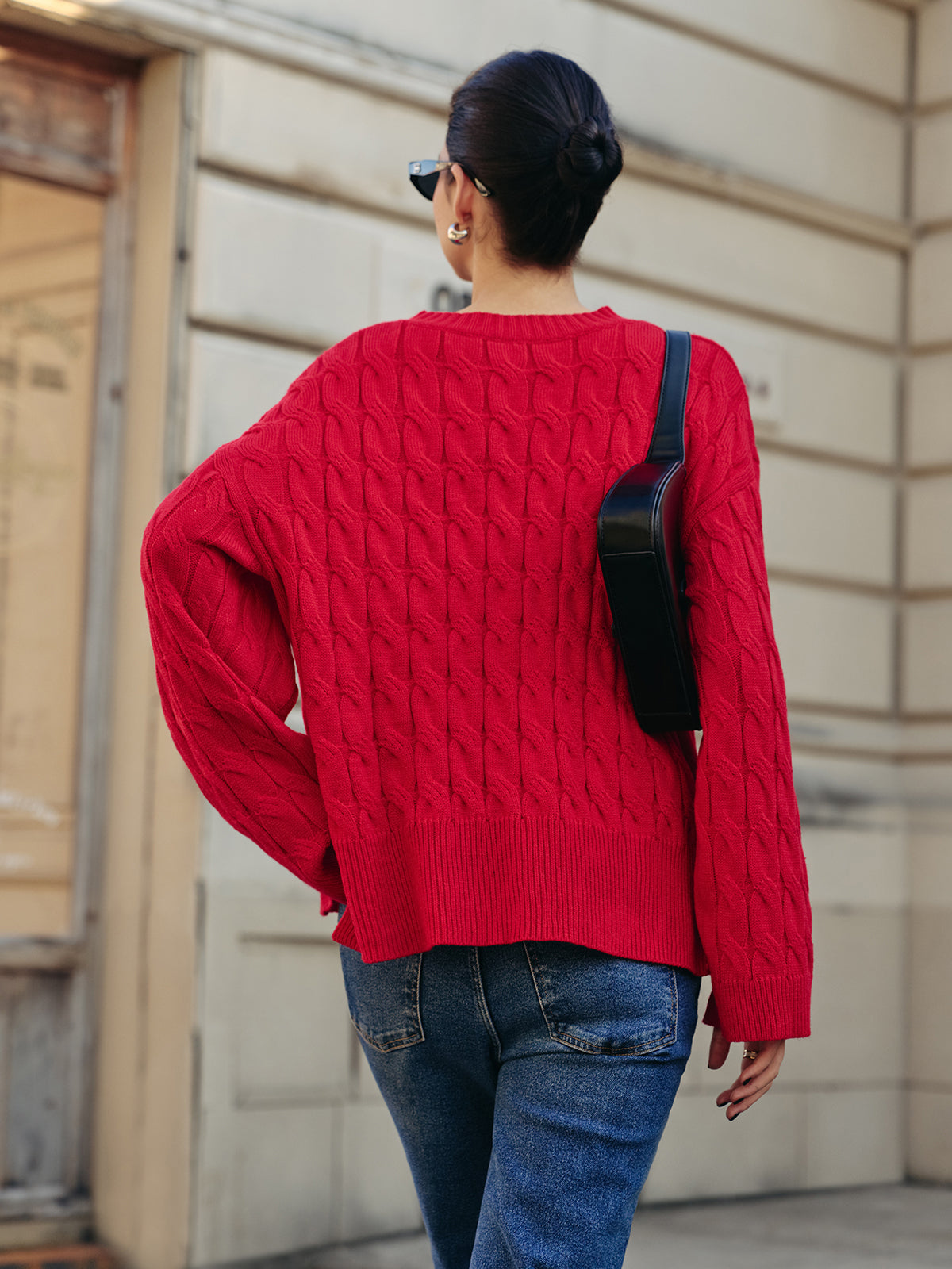 Pull torsadé fendu sur le côté 