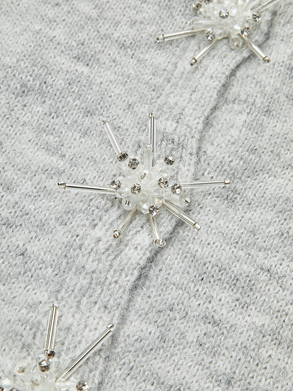 Pull en laine mélangée orné de strass 