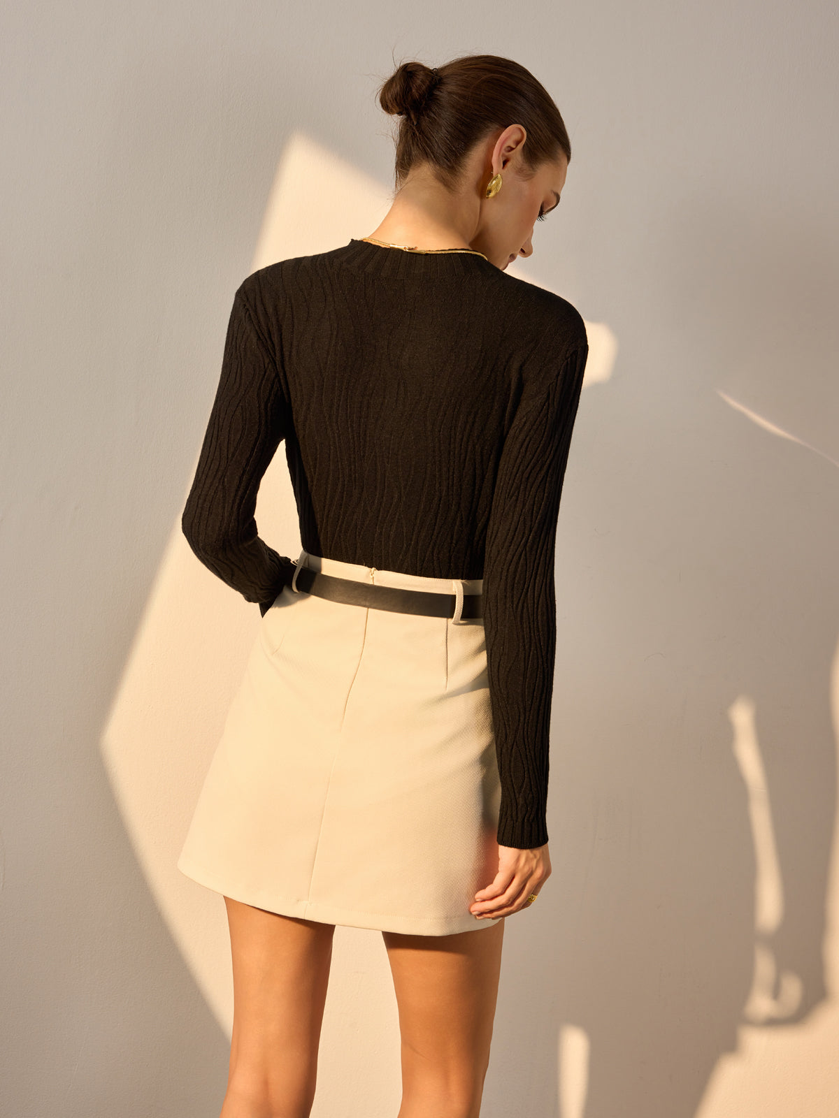 Minimalistisches, schmal geschnittenes Plissee-Stricktop 