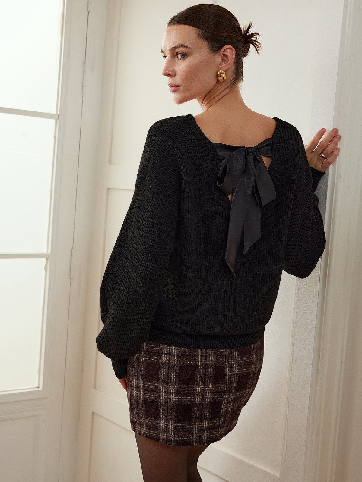 Pull côtelé à col en V et nœud 