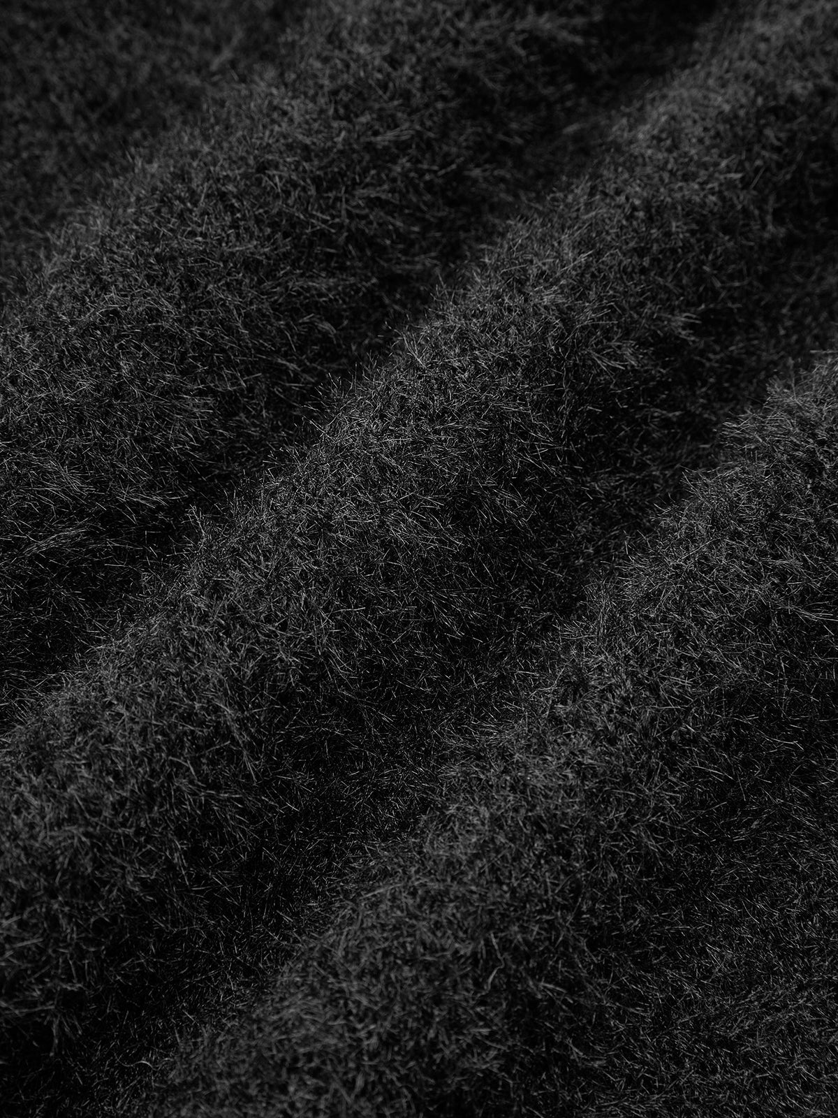 Haut en maille à nœud décoratif perlé 