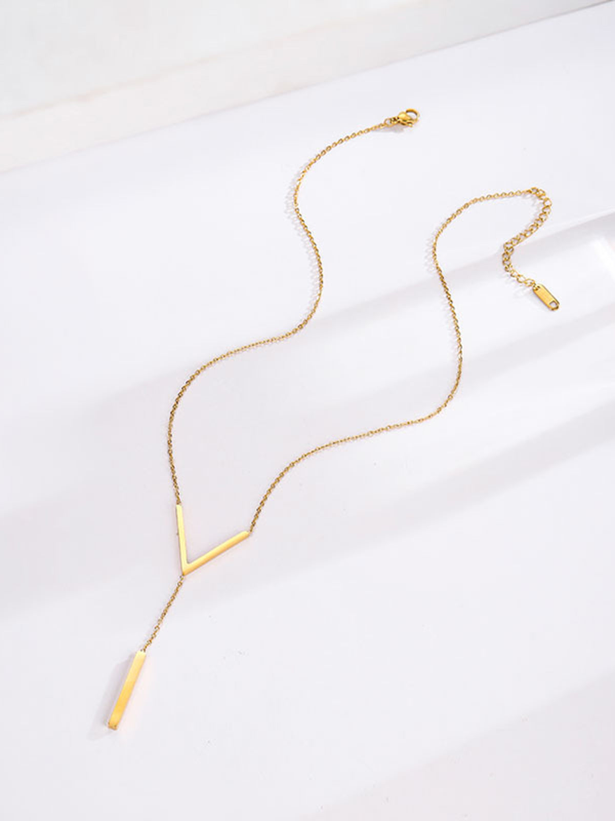 Collier pendentif géométrique 