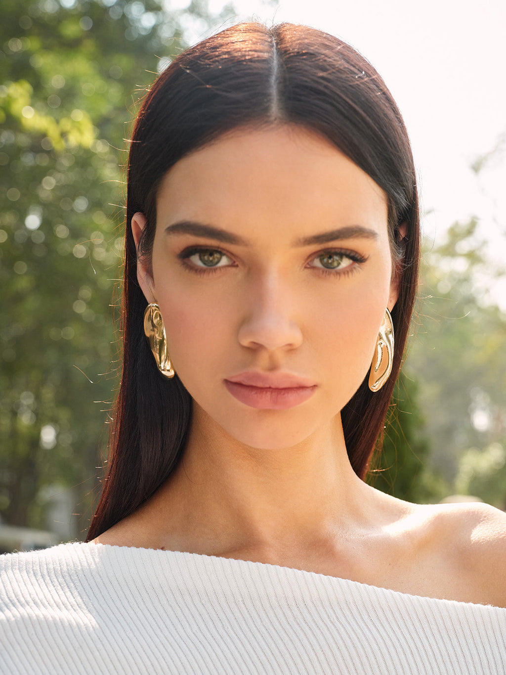 Boucles d'oreilles clous asymétriques épaisses