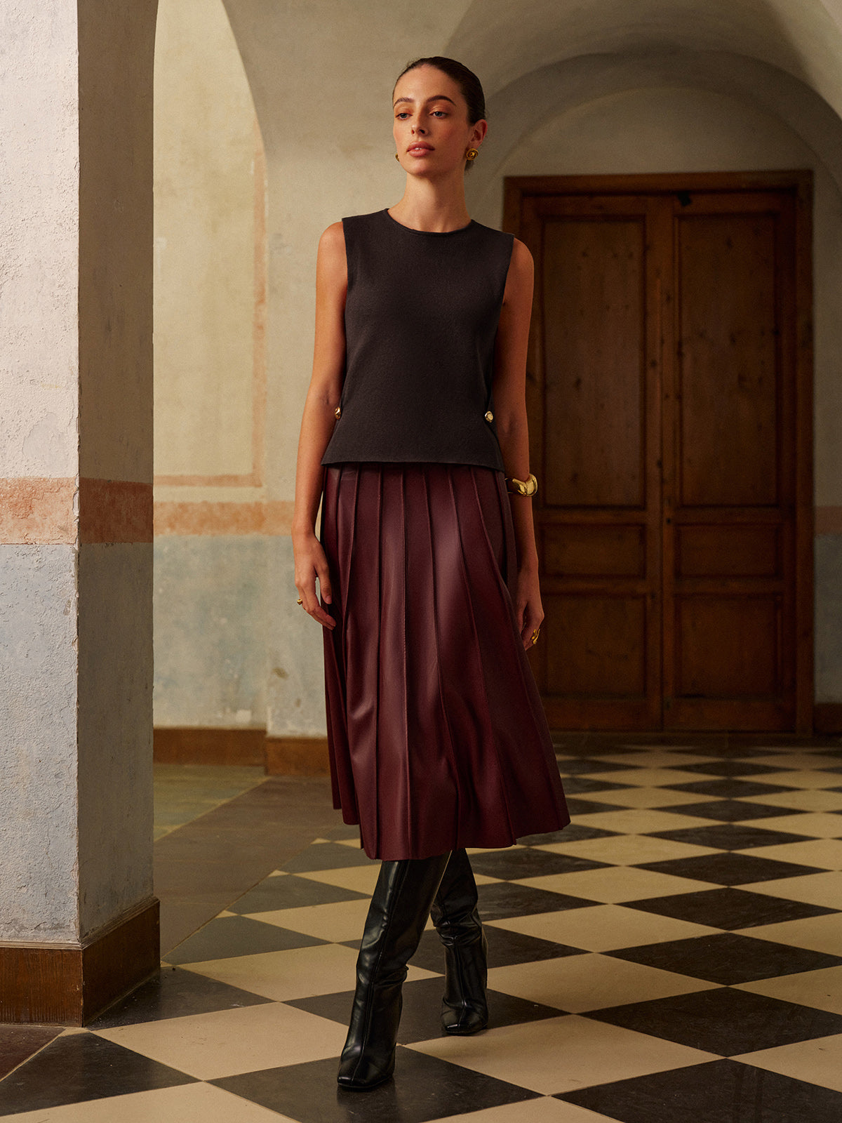 Strickweste mit Metalldetail im Regular Fit