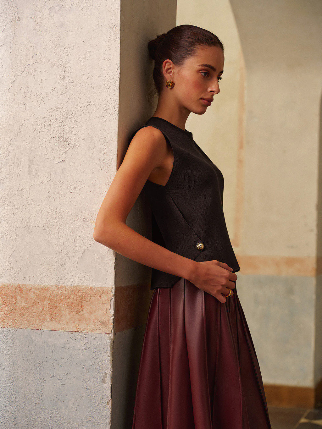 Strickweste mit Metalldetail im Regular Fit