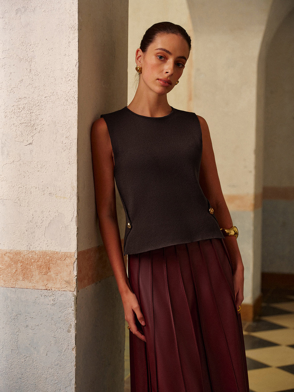 Strickweste mit Metalldetail im Regular Fit