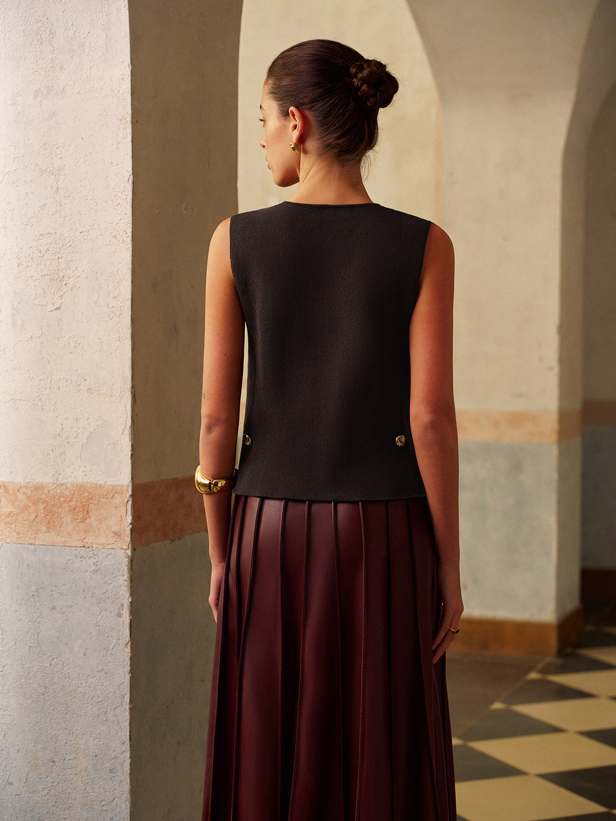 Strickweste mit Metalldetail im Regular Fit