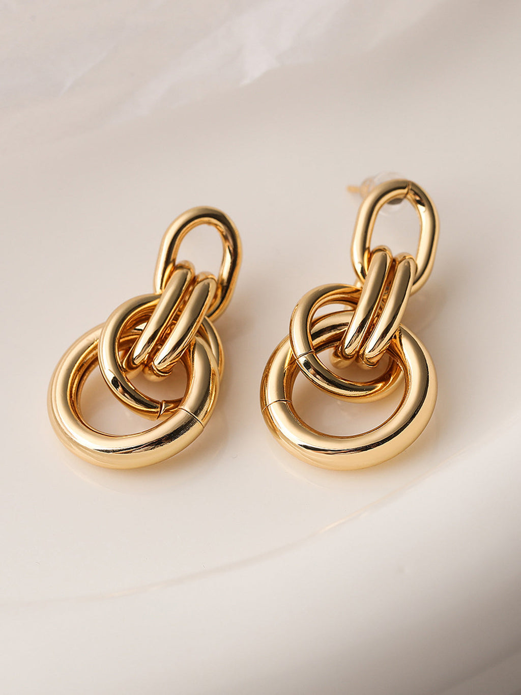 Boucles d'oreilles créoles nouées épaisses
